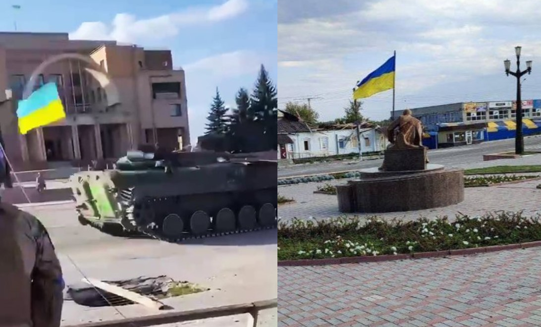 Синьо-жовтий прапор в Балаклії. На фото ліворуч - міська рада, проворуч - пам'ятник на площі перед міськрадою